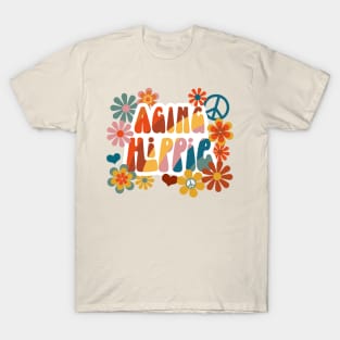 "Aging Hippie" in 70s font with flower power and peace signs - groovy! T-Shirt